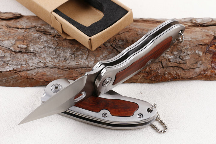 Browning F113 folding knife with wood and steel handle UD405196